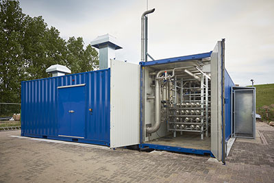 Impianto di biogas a Waalwijk, Olanda. L'impianto utilizza sfalci verdi, rifiuti vegetali e scarti organici del commercio per produrre biogas per oltre 2000 persone. Foto di: www.host.nl